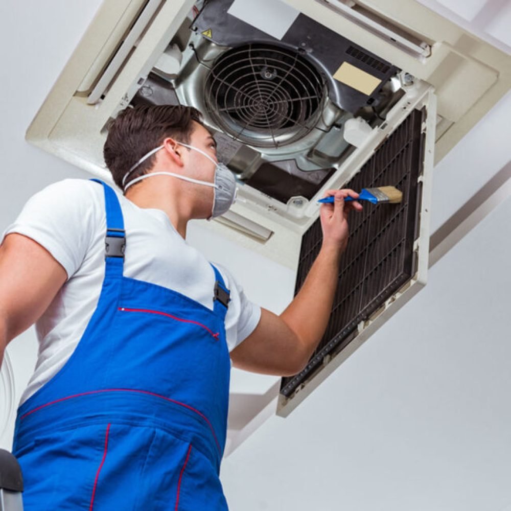 man-repairing-air-conditioner-1024x640